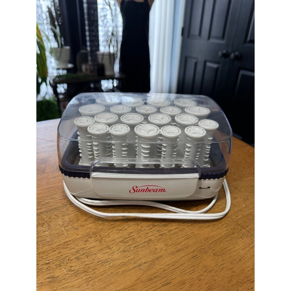 Sunbeam SureSetter hot rollers, model SBPC70, designed to heat curlers